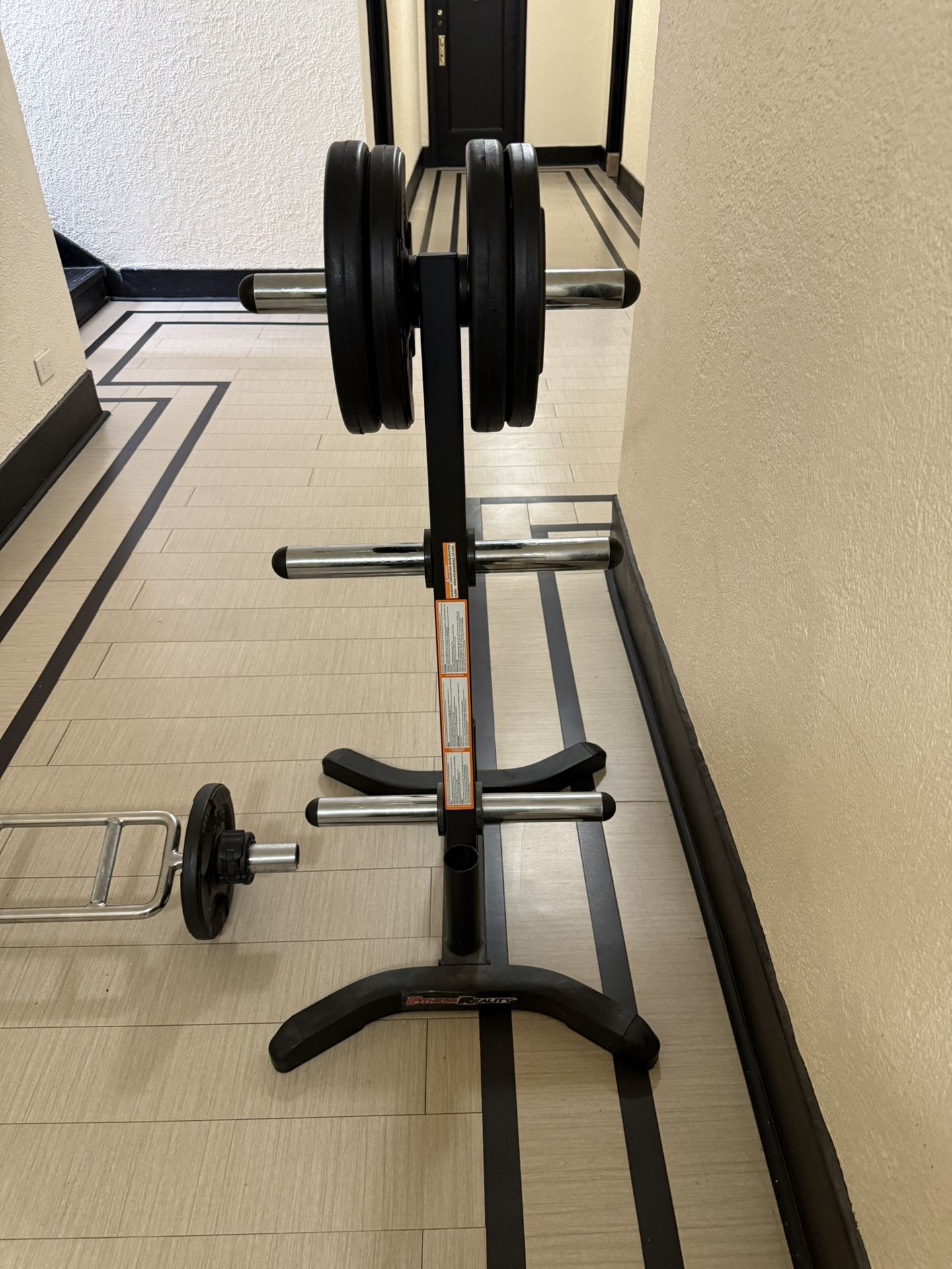 RUBBER COATED OLYMPIC WEIGHT PLATES AND WEIGHT STAND (BRAND NEW CONDITION)