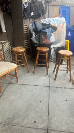 Real wood bar stools not Mickey Mouse wood