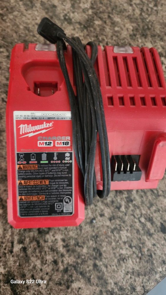 Milwaukee M18 Red Lithium Battery And Charger