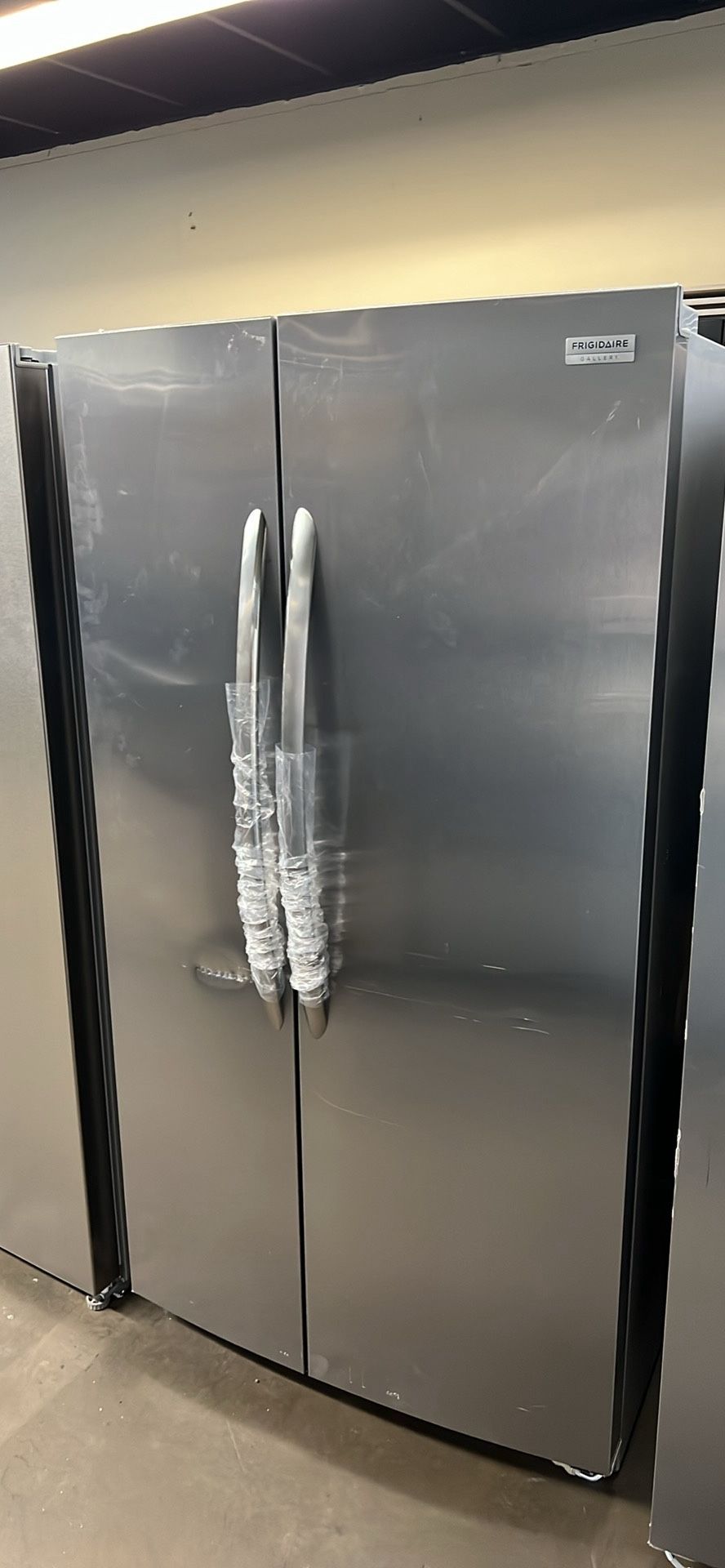 Frigidaire Stainless Steel Side By Side Refrigerator With Water/Ice Dispenser 