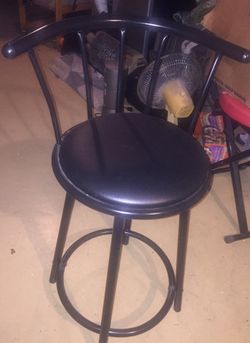 Black chair with long legs