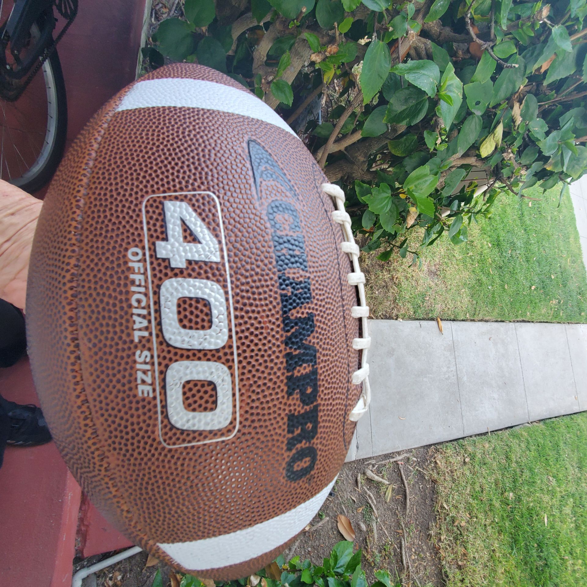 Official Size football. Champro 400 composite.