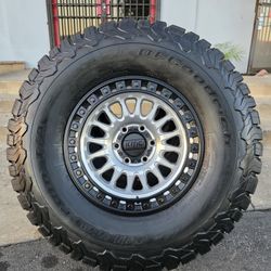17" KMC rims w- 35" BfGoodrich KO2 tires like new.  $2k