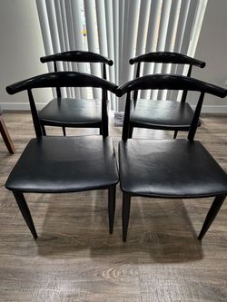 Set of 4 Black Dining Chairs. OBO