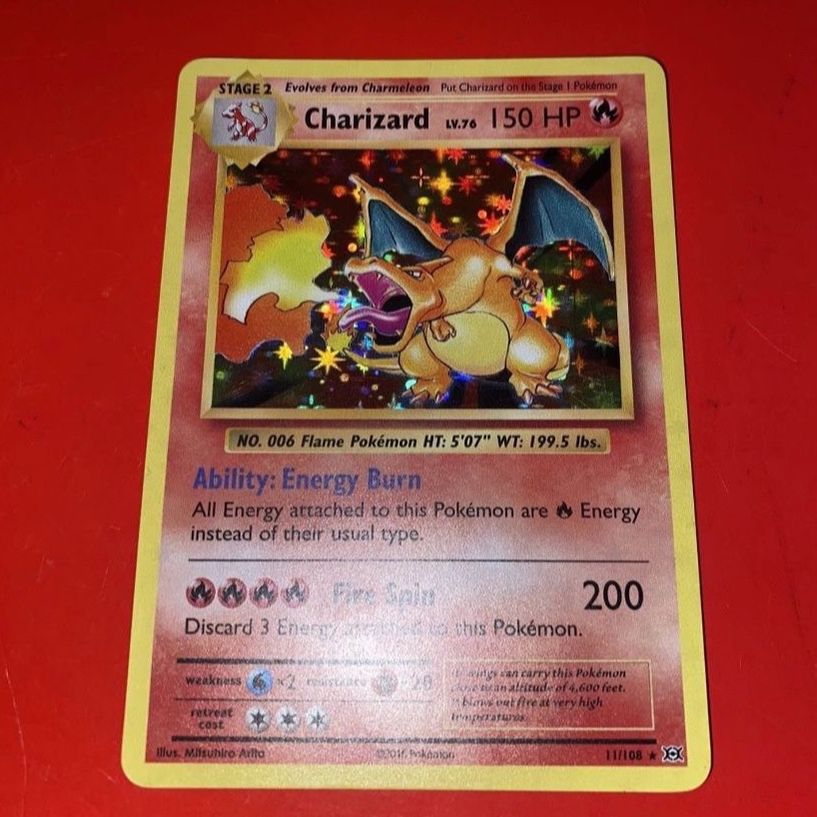 charizard pokemon card 11/108 holo Pokemon Charizard 11/108 HOLO (2016) PSA 6