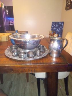 Oneida 12 Tea Cups,1 Punch Bowl ,1 Tray, 1 Serving Spoon,1 Tea Put