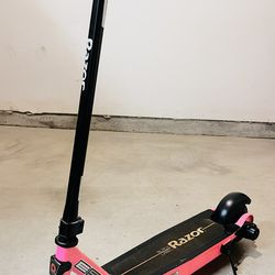Razor Black Label E90 Electric Scooter in pink.