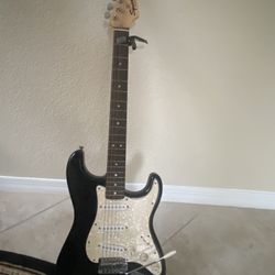 Squier Sonic Stratocaster Electric Guitar  With Fender Frontman 10G Amp Black