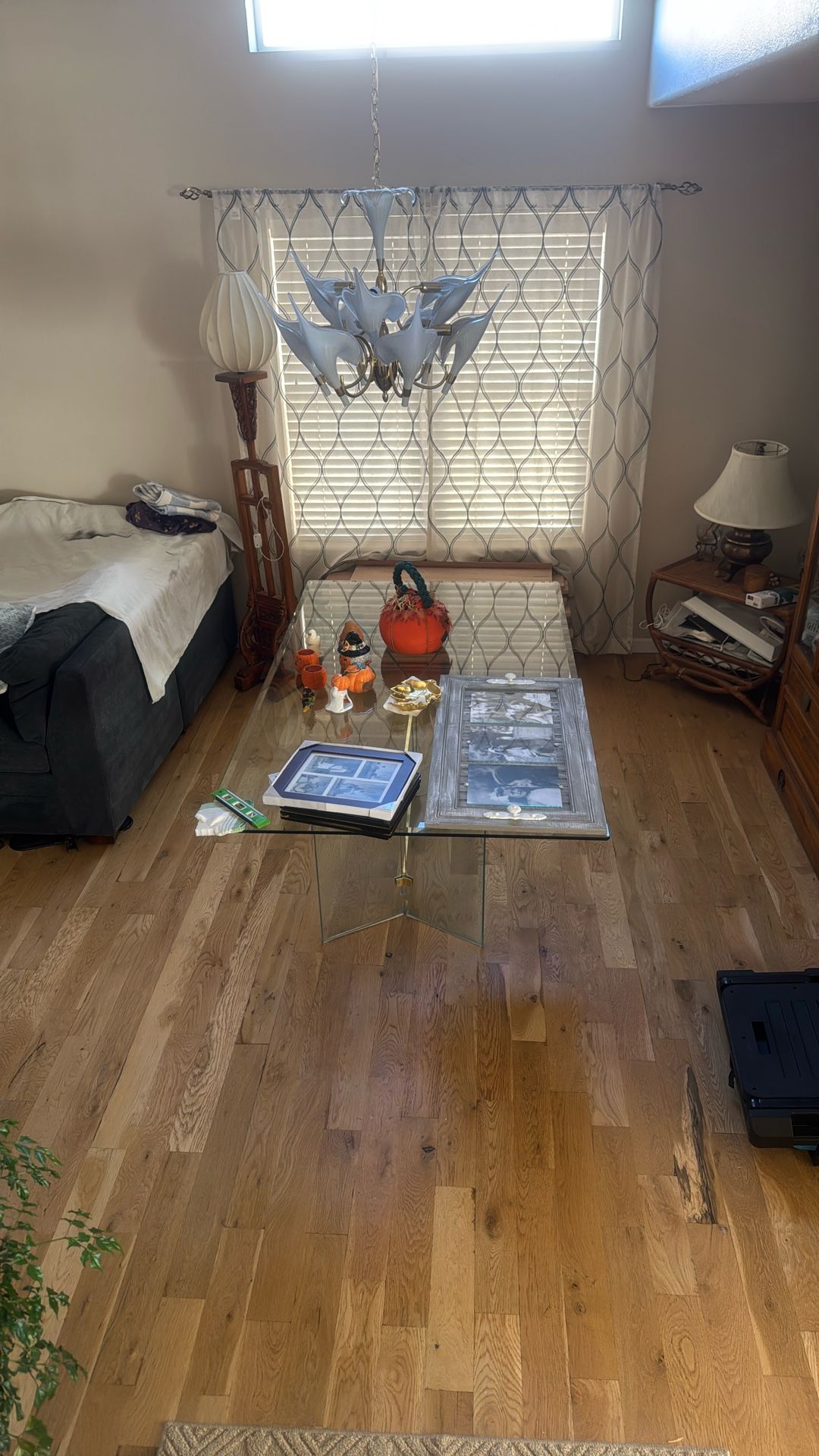 Beveled glass table with metal frame and chairs.