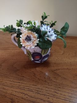 Handmade shells in creamer cup