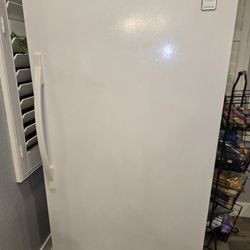 Stand up Whirlpool  freezer.