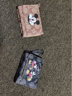 Disney x coach mini wallets