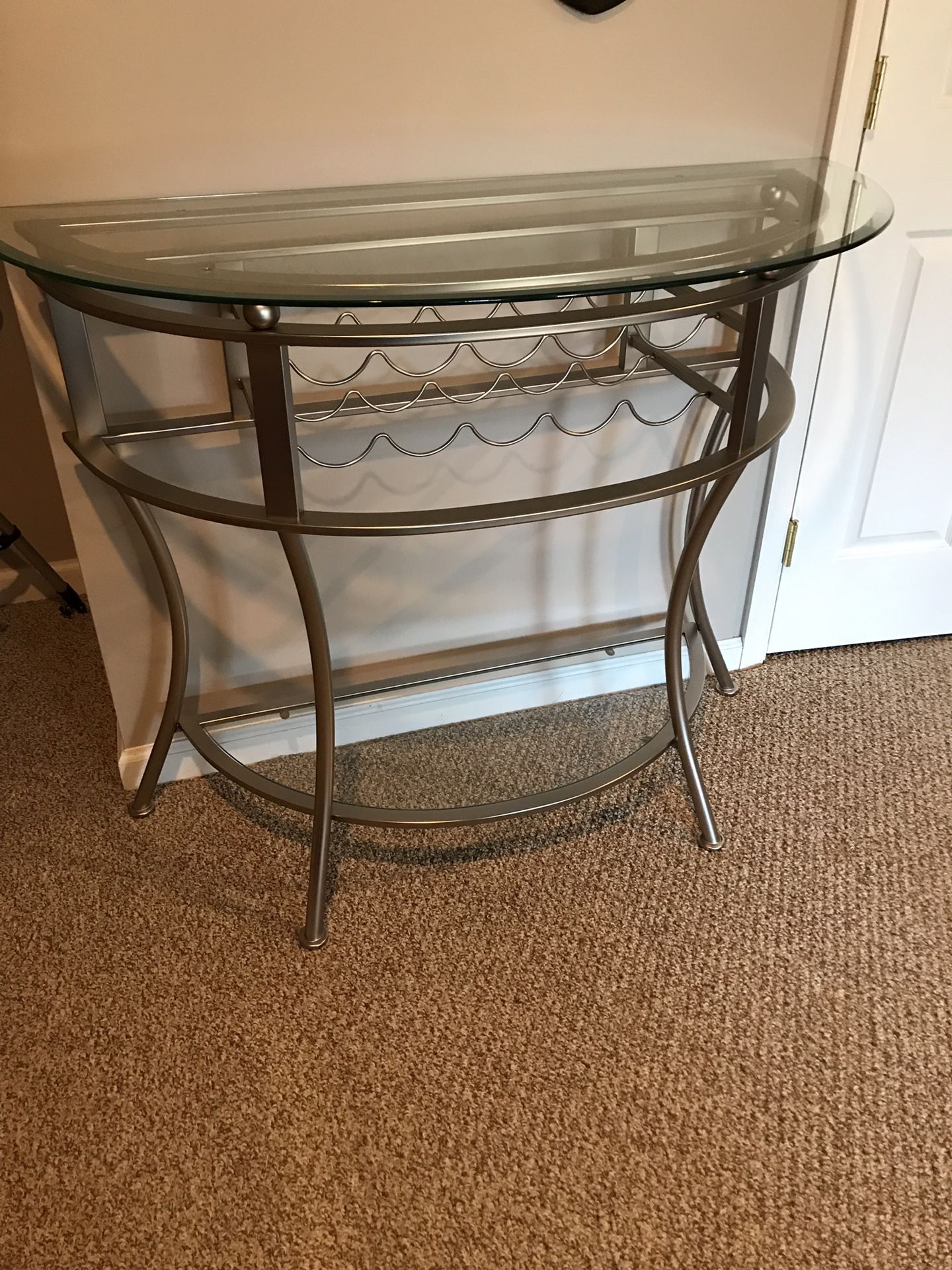 Sofa table/wine rack with glass top