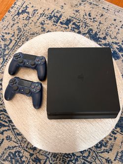 Play Station 4 with two controllers