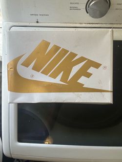 Gold and white 6.5 Jordan 1s