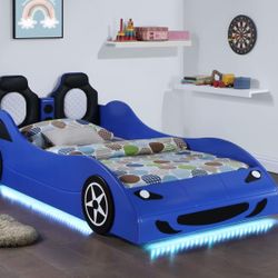 Brand New In Box.  Twin Size Car Bed With Led Lights.  Mattress Sold Separate.  Comes In Blue Red Or White. 