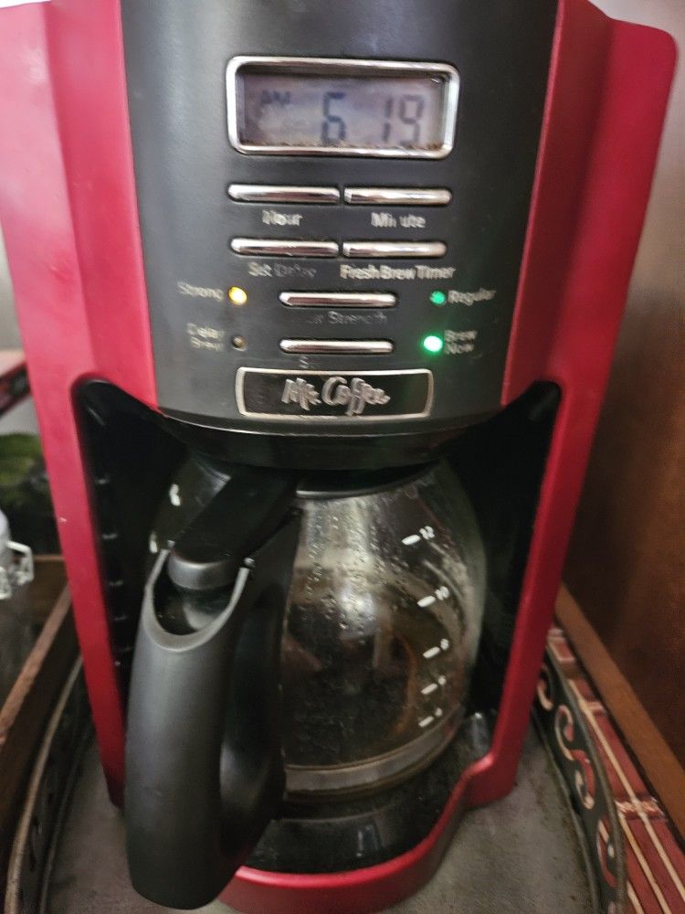 Dark Red With Black. Works Great. Pick Up