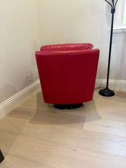 Red leather swivel chair. Excellent like new