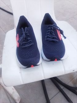 Brooks Men Glycern Max Neutrel Running Shoes and a pair of White Running Shoes From Brooks Worth 200 Bucks