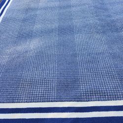 Rug White And Blue  Has Small Spot On It But Otherwise It's In Good Shape  10x8  Cash Only 