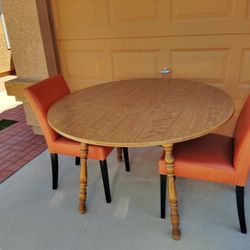 48-in Round Dining Table With Two Leather Chairs. Great For A House Or Apartment.