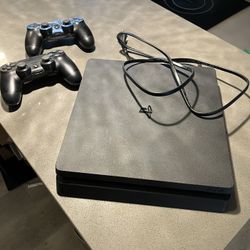 PlayStation 4 + Two Controllers. PS4. $200