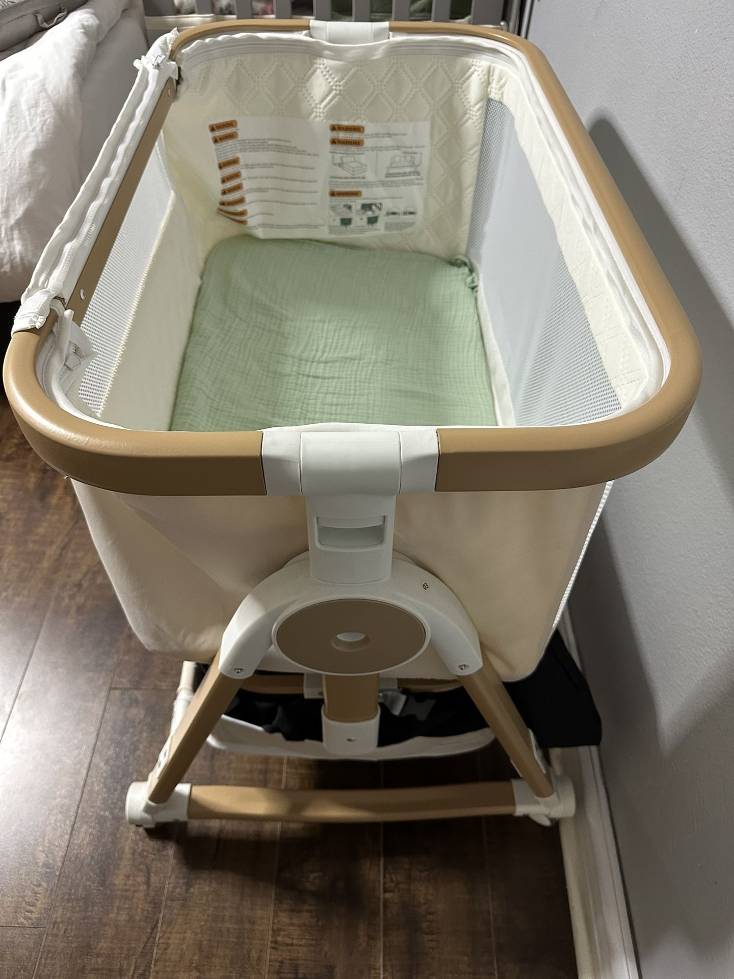 Baby Bassinet Like New - Heigh Adjustable & Wheel Turns To Cradle