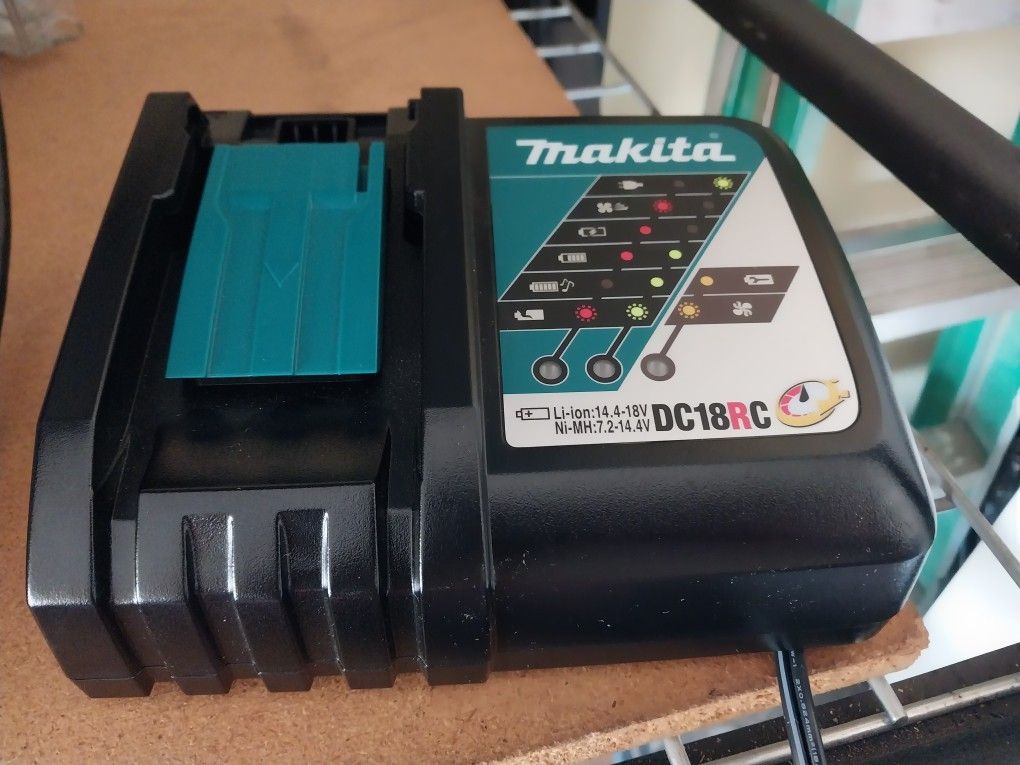 MAKITA DRILL CHARGER (NEW) NEVER USED