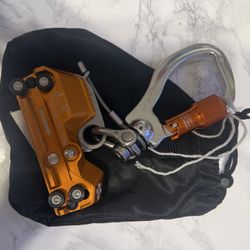 The item is a MILLER fall arrester Söll Bodycontrol I, GlideLoc, a safety device used for fall protection when climbing on a vertical rail system