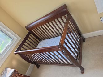 Brown baby crib
