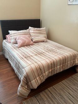 Full size bed frame and memory foam mattress.
