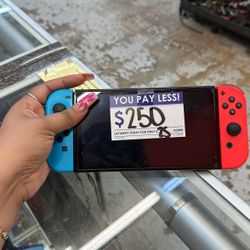 Nintendo Switch With Charger and Other Accessories 
