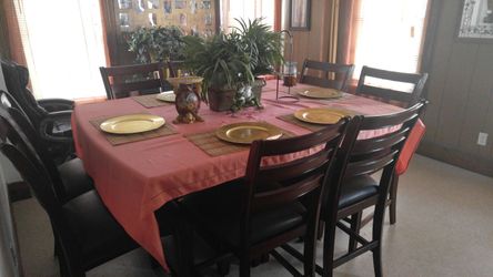 Brand new table with 8 chairs I paid $3,000 Im skin $2500