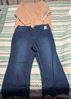 Size 3XL sweater and wide legged jeans
