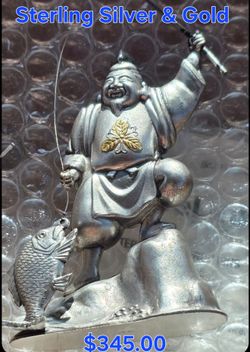 Sterling Silver and Gold Statue
