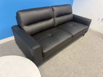Black Modern Sofa with Padded Back and Wood-Look Legs – $225 OBO
