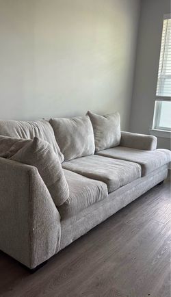 Beige 3 seat sofa