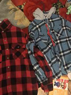 Two Quicksilver bottom up sweaters.