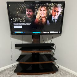 50” Emerson Tv w/ fire tv and 3 tier stand