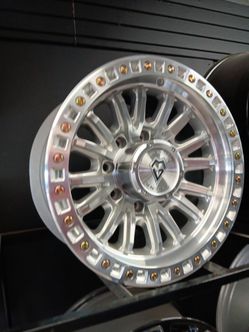 17x9 arena rims 8 lug 8x170 on new tires 35 1250 17 lt