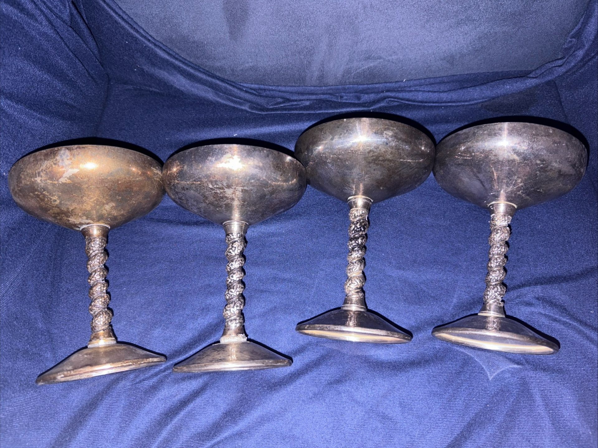 Vintage Valero Spain 4 Silver Plate Champage Goblet Twisted Stem Set Stems has interesting welding on bottom not sure if manufacturer made this or if