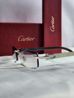 White Cartier buffs