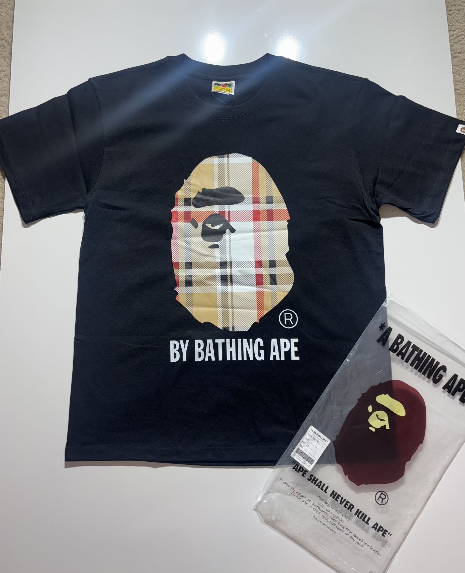 bape / burberry tee shirt 
