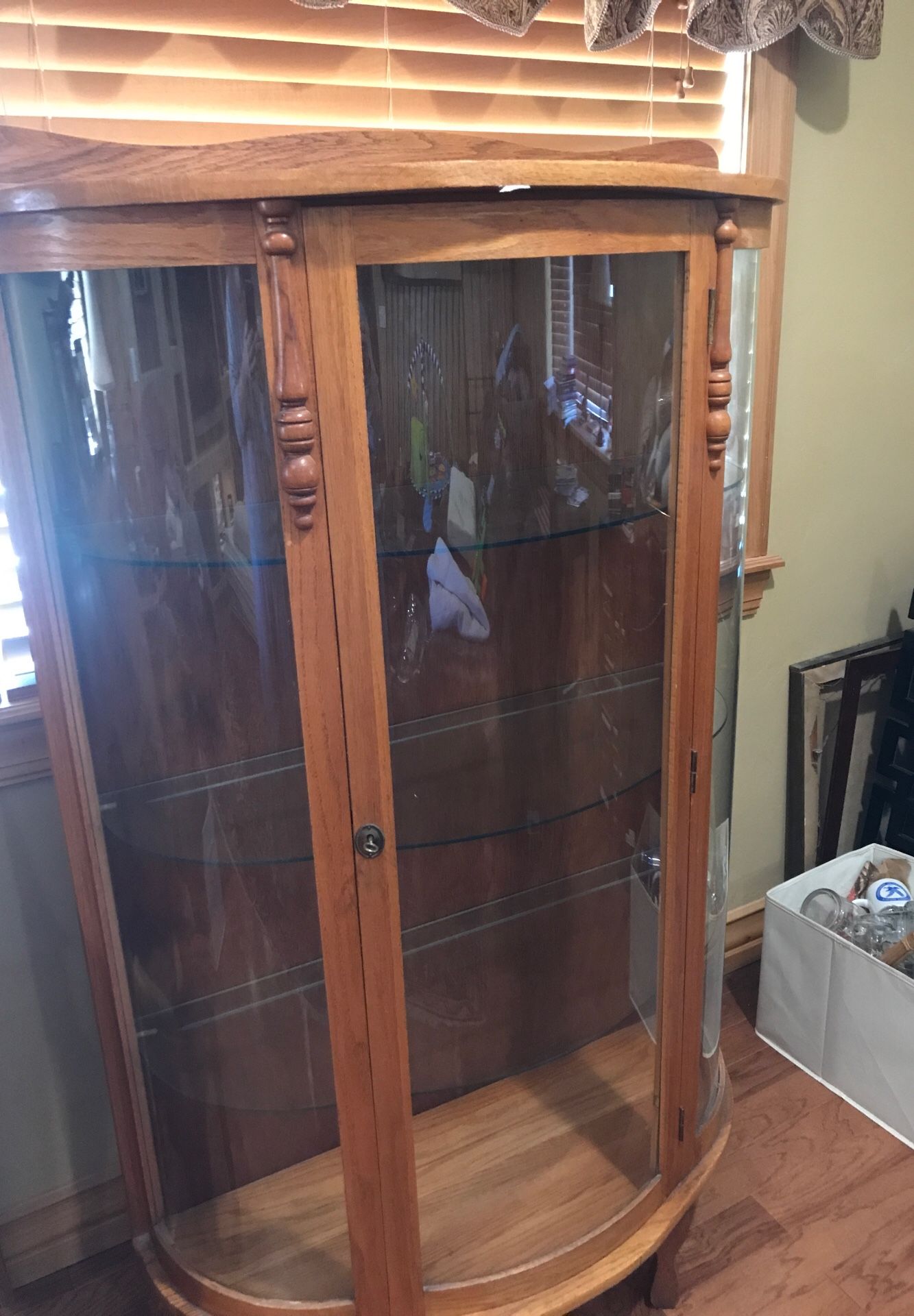 Antique oak china cabinet with glass shelves