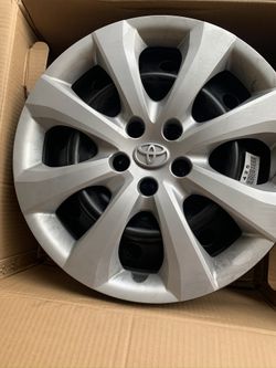 4 BRAND NEW Toyota Stock Rims & Hub caps