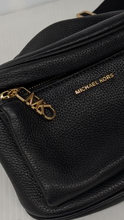 MK sling pack $60