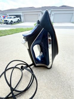 Selling a Rowenta Access Steam 1725 Iron.