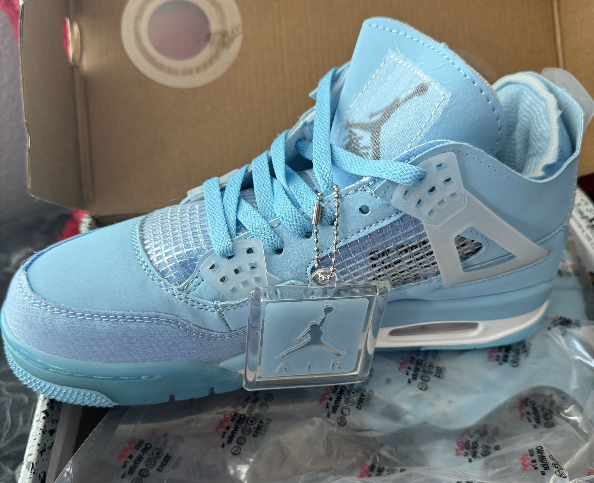 New light blue Off White 4s sneakers 