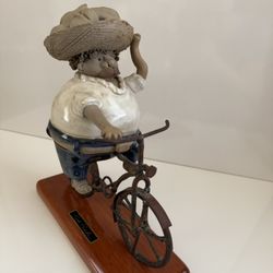 Baker On A Bike- Handmade Ceramic Sculpture by Rodo Padilla
