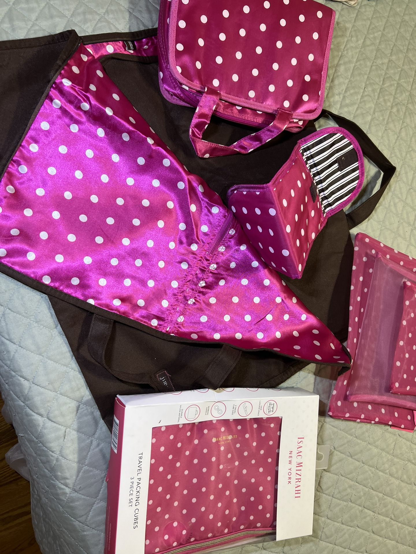 Travel kit, garment bag, curling iron holder, makeup bag, clothes holder